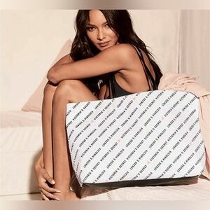 Victoria’s Secret white with black “Victoria’s Secret” tote with hearts